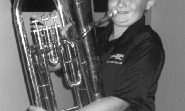 Young tuba player performs in Honor Festival